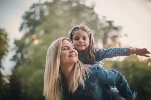 happy mum and daughter following mediation to resolve parental alienation Harrow
